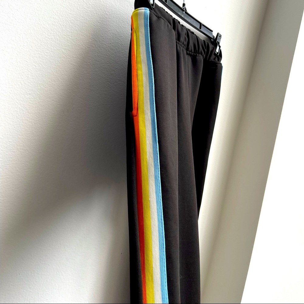 Black heavy leggings with rainbow decor on the sides